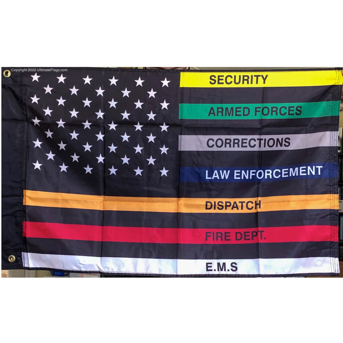 This image features a patriotic flag designed for various service professions, including security, armed forces, corrections, law enforcement, and emergency services. It showcases vibrant colors and bold text, making it a perfect display for honoring these essential roles. For those looking to buy online, this flag is available at a cheap and affordable price, making it one of the best options for showing support. Visit UltimateFlags.com for more details.