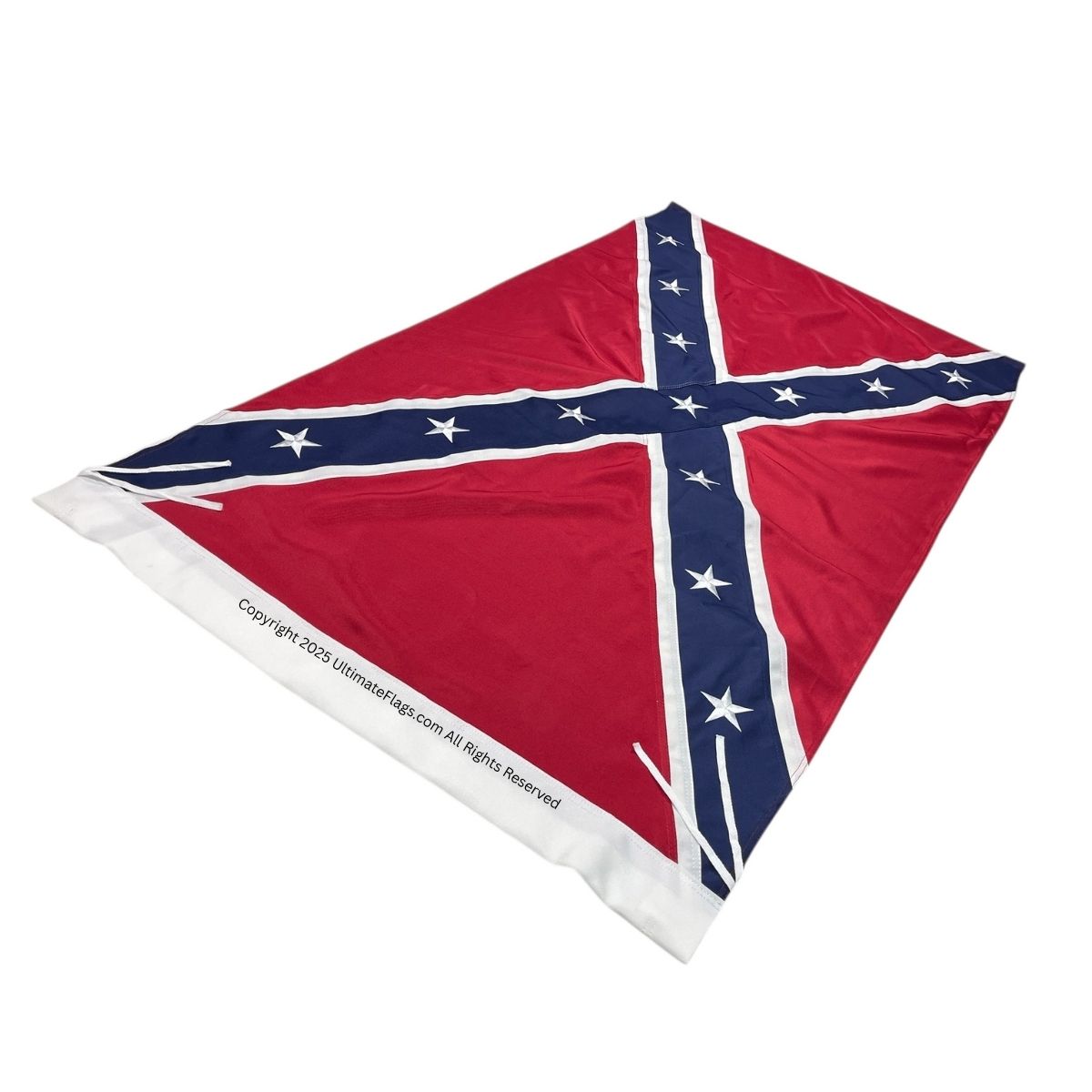 Confederate flag displayed on a flat surface, showcasing its vibrant red, blue, and white colors, ideal for collectors and enthusiasts. This affordable option is perfect for those looking to buy online. For the best deals, visit UltimateFlags.com.