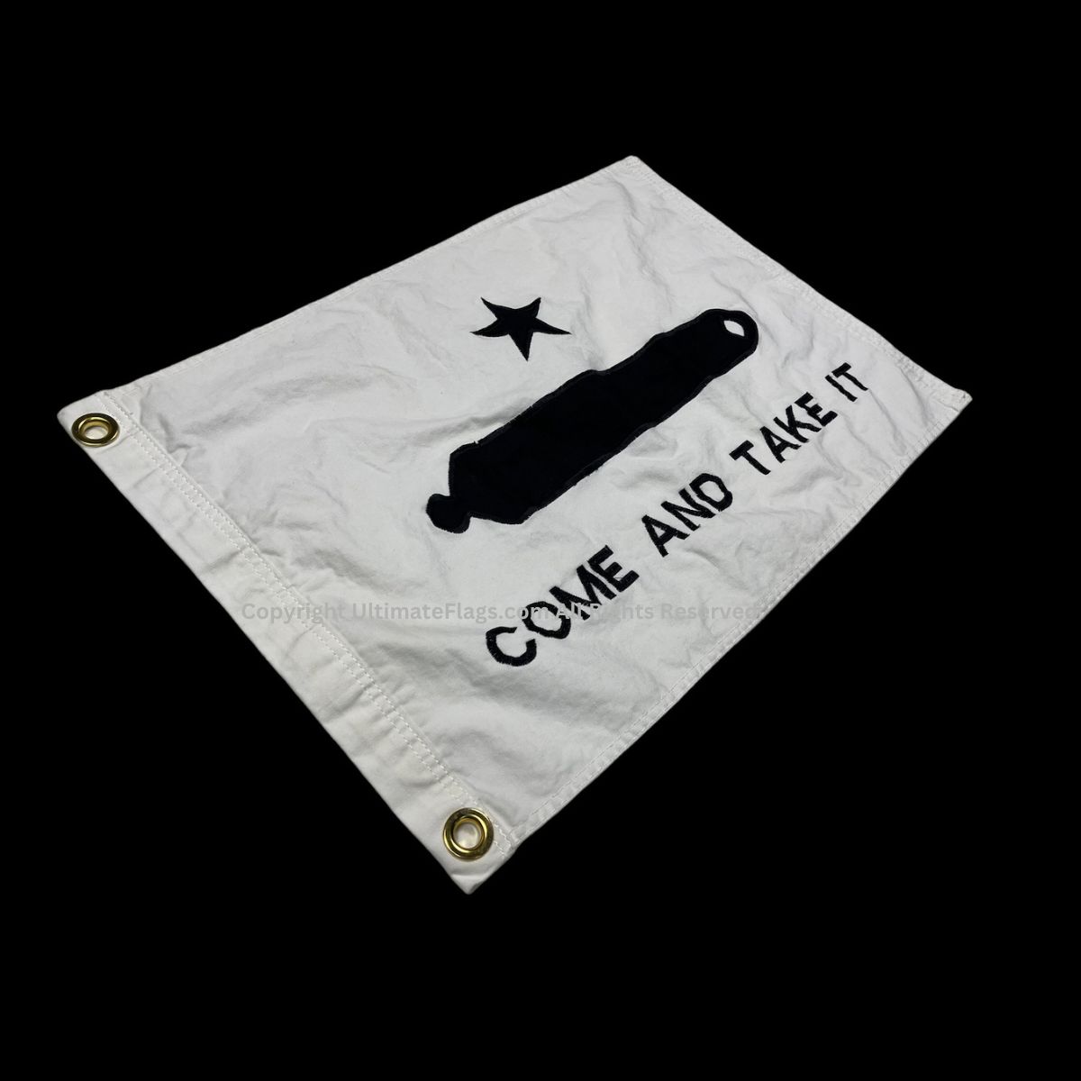 A white flag featuring the phrase "Come and Take It" along with a black silhouette of a cannon and a star, symbolizing resilience and defiance. This affordable flag is perfect for those looking to make a statement. Buy online at UltimateFlags.com for the best selection of flags.