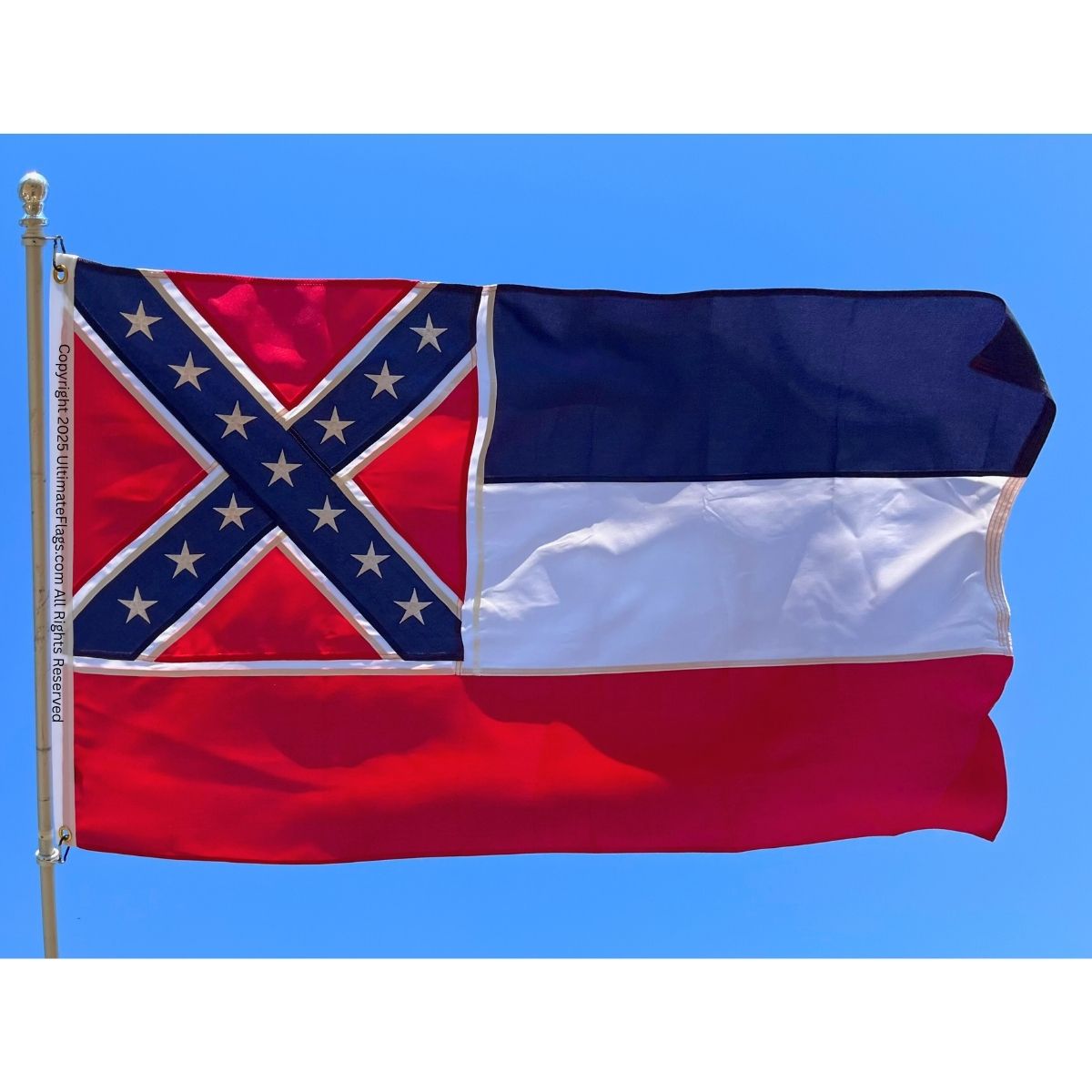 Mississippi state flag waving against a clear blue sky, representing Southern heritage and pride. This affordable flag is perfect for showcasing your love for Mississippi and is one of the best options to buy online. Visit UltimateFlags.com for cheap and high-quality flags.