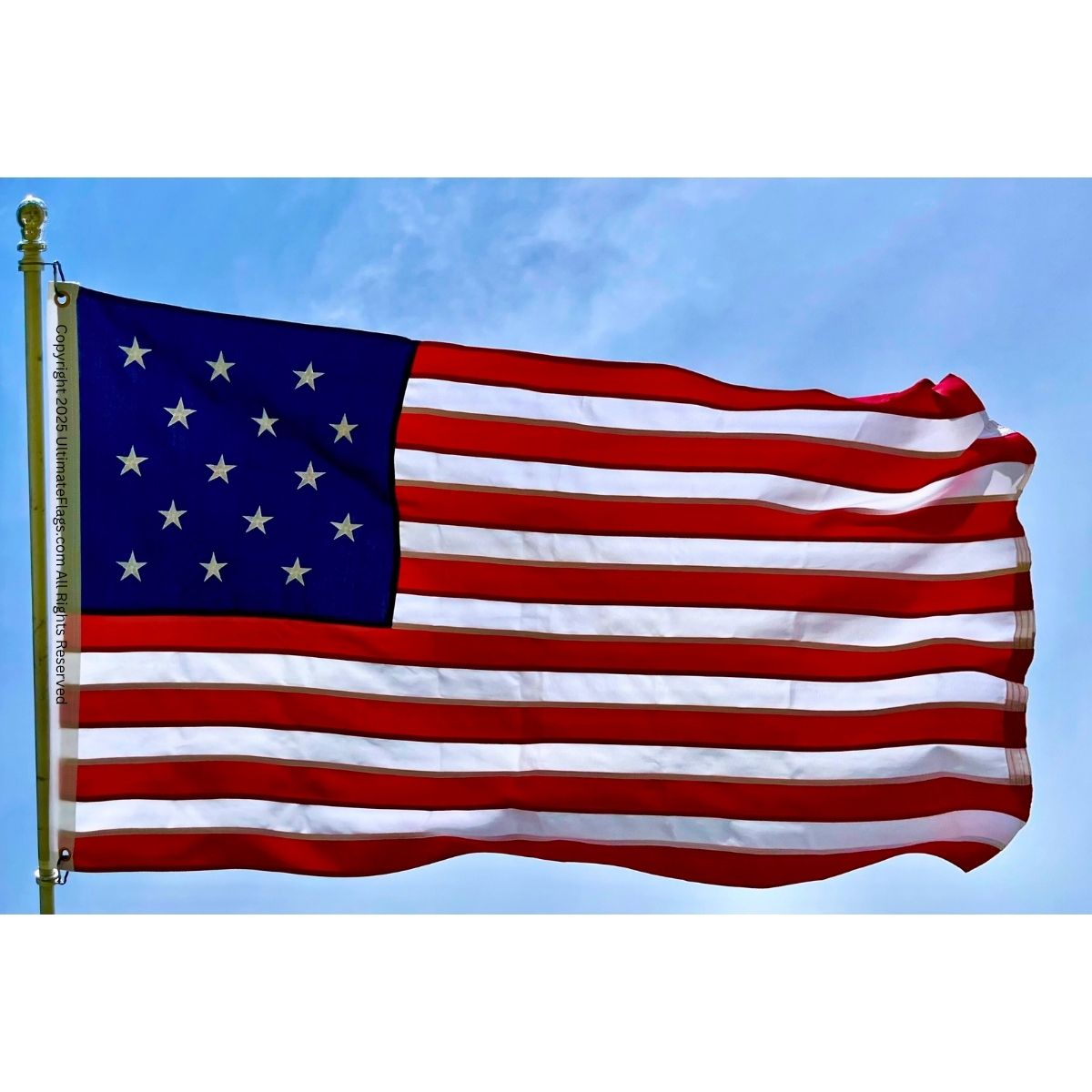 American flag waving against a clear blue sky, symbolizing patriotism and national pride; perfect for outdoor display or events. Buy online at affordable prices and discover the best options for your needs at UltimateFlags.com.