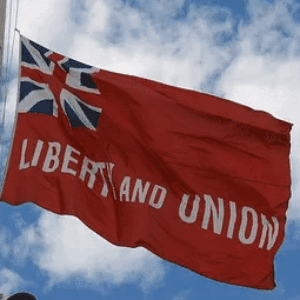 Red flag with "Liberty and Union" text, featuring the Union Jack design, perfect for patriotic displays. Buy online for cheap and affordable options at UltimateFlags.com.