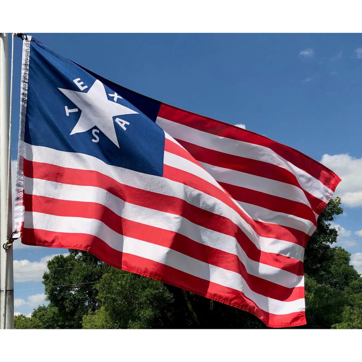 This image features a vibrant American flag with bold red and white stripes and a blue field adorned with a white star. It's perfect for anyone looking to buy online a cheap and affordable flag for their home or events. Discover the best options for flags at UltimateFlags.com.