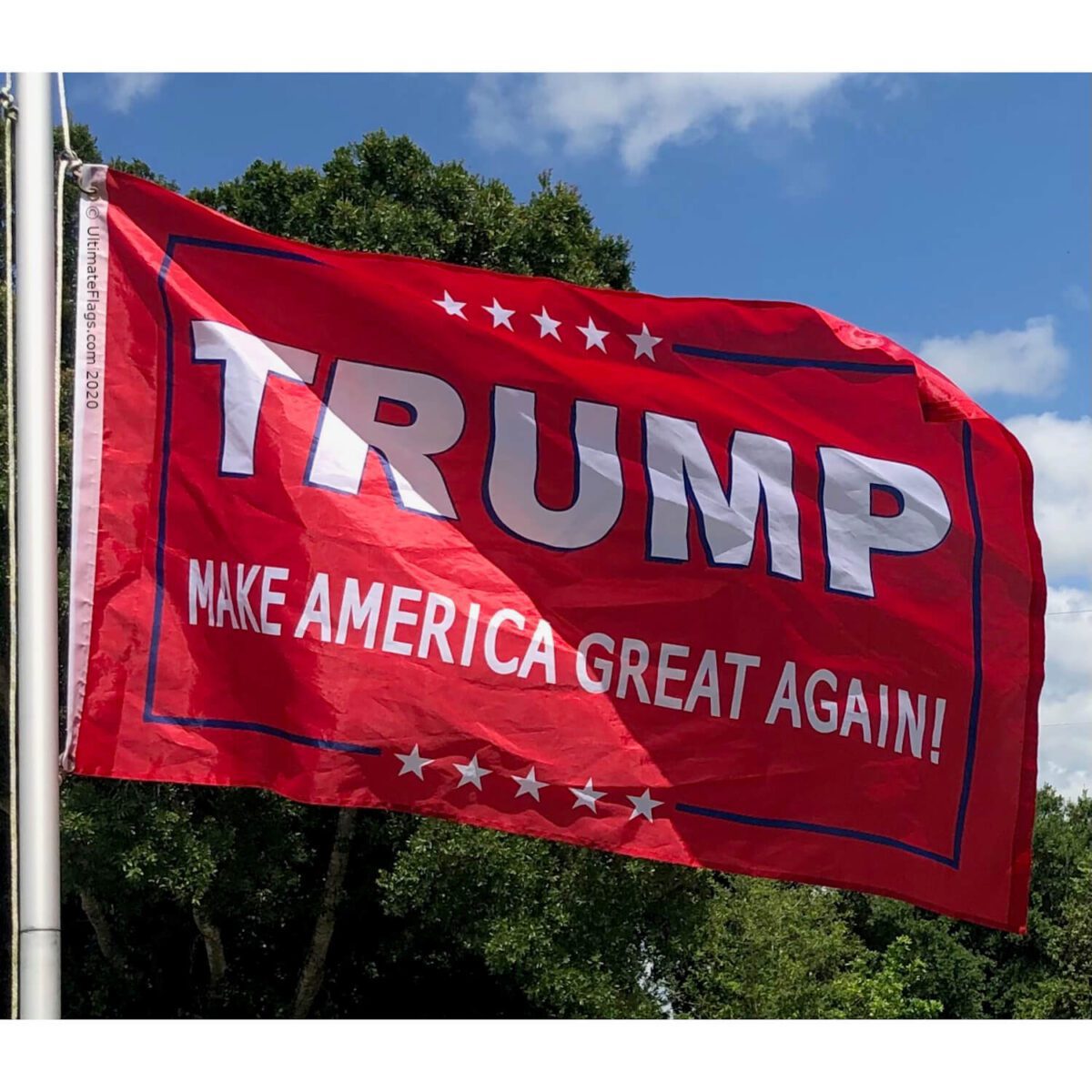 Red Trump flag displaying "Make America Great Again!" with bold lettering, perfect for showing support at rallies or events. This affordable and stylish flag is a great way to express your political beliefs. Buy online for the best deals at UltimateFlags.com.