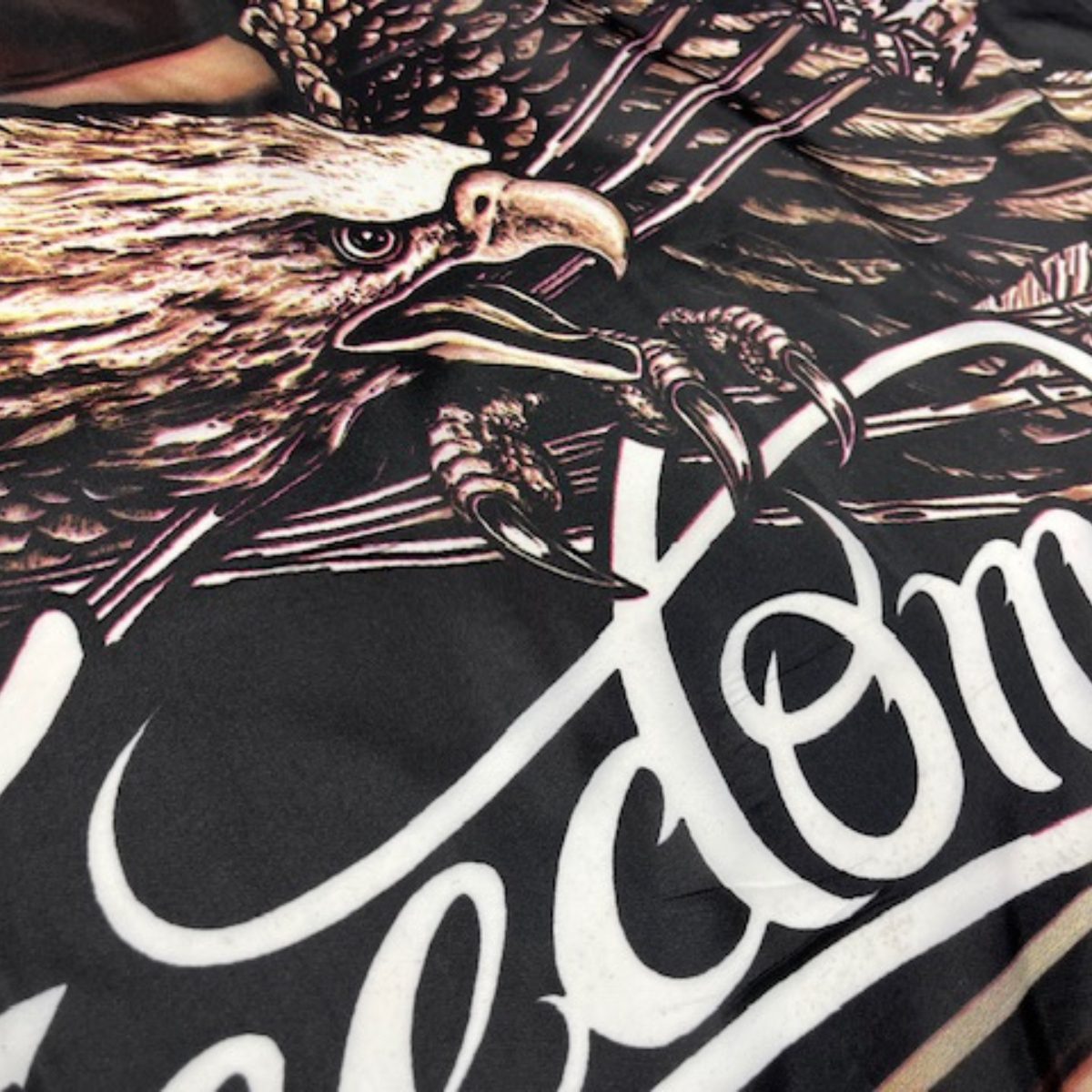 Eagle design featuring the word "Freedom" prominently displayed, perfect for patriotic celebrations. This high-quality flag is cheap and affordable, making it the best option to buy online. Available at UltimateFlags.com.