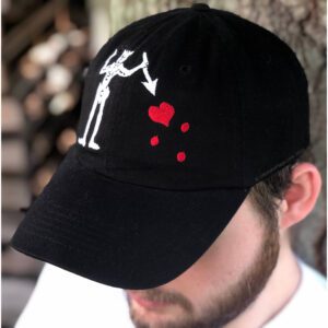 Stylish black baseball cap featuring a unique skeleton design with red hearts, perfect for casual wear. This affordable cap is a great choice for those looking to buy online at the best prices. Find more options at UltimateFlags.com.