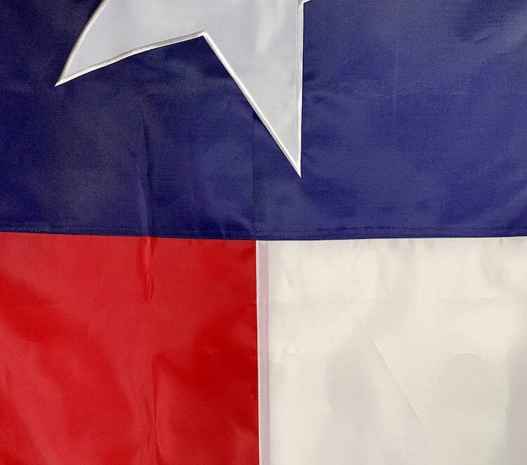 Texas flag featuring bold colors and a prominent star, perfect for showcasing state pride. Ideal for those looking to buy online at cheap and affordable prices. Discover the best selection at UltimateFlags.com.
