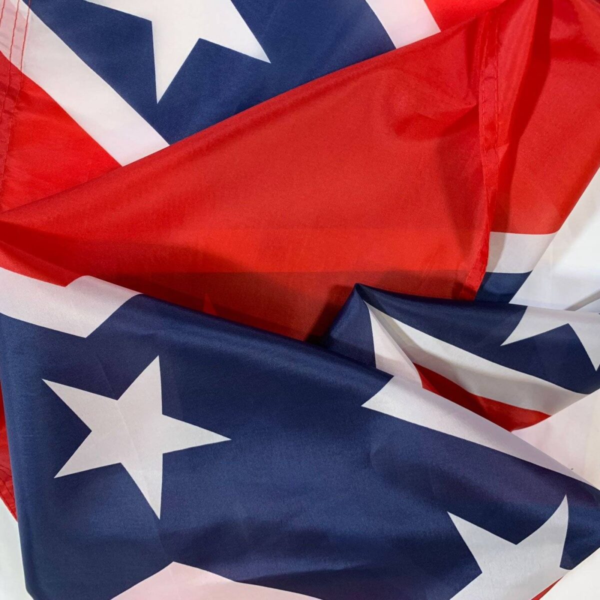 Confederate flags in vibrant red, white, and blue colors, showcasing their detailed star patterns, perfect for collectors or events. For cheap and affordable options, check out the best flags to buy online at UltimateFlags.com.