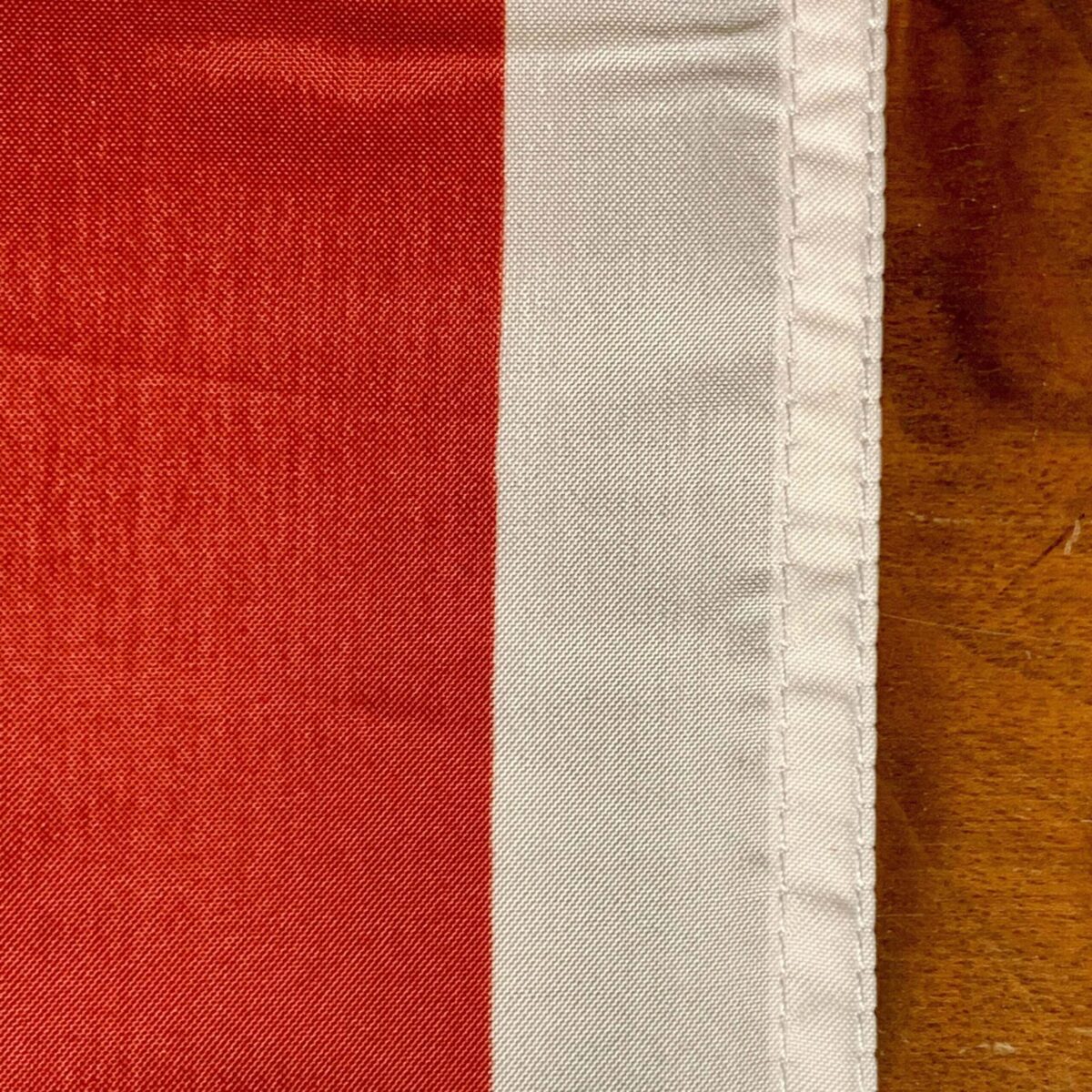 This image showcases a close-up of a flag with vibrant colors, ideal for those seeking cheap and affordable flags to buy online. Perfect for decoration or events, this flag represents quality and style, making it one of the best options available. Visit UltimateFlags.com for more details.