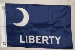Blue flag featuring the word "LIBERTY" in white text, ideal for patriotic displays or home decor. This flag is a cheap and affordable option for anyone looking to buy online. Discover the best selection of flags at UltimateFlags.com.