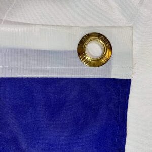 High-quality close-up of a flag showing a gold grommet and durable stitching, perfect for outdoor use. Ideal for those looking to buy affordable and cheap flags online. Discover the best options at UltimateFlags.com.
